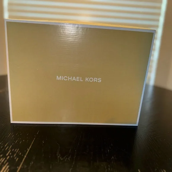 Michael Kors White and Silver Sneakers - Picture 2 of 5